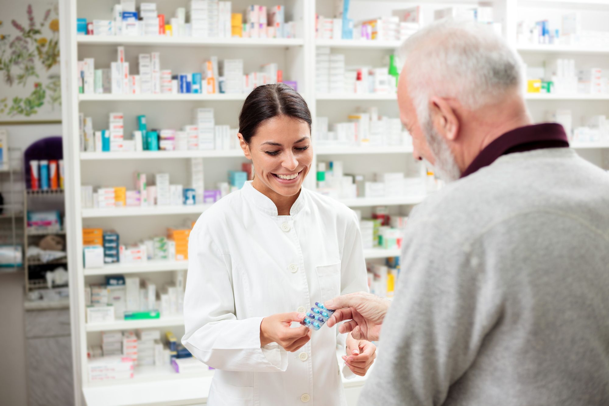 Inside the Del Mar Medical pharmacy with stocked shelving
